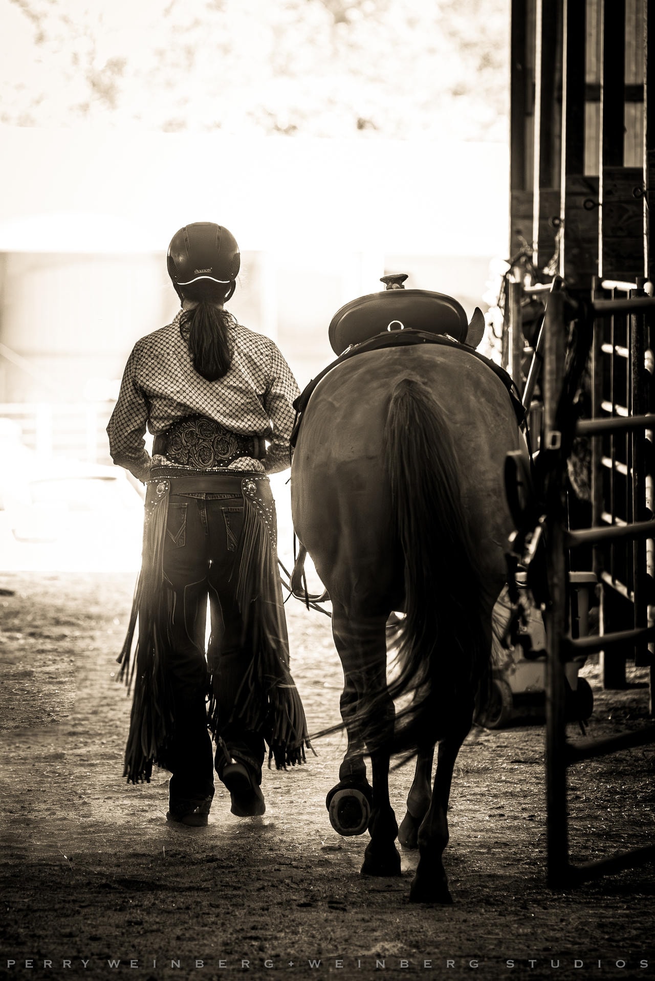 Kelly walking with her horse